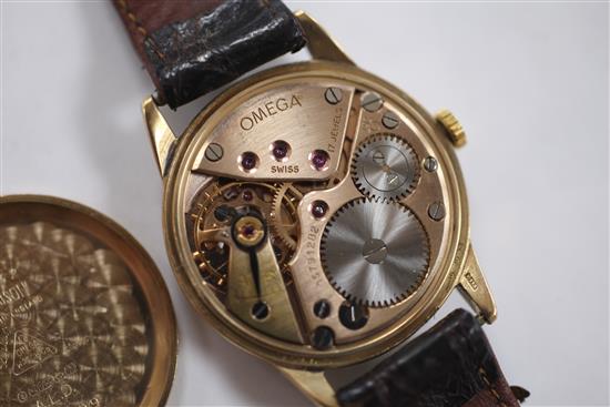 A gentlemans late 1950s 9ct gold Omega manual wind wrist watch,